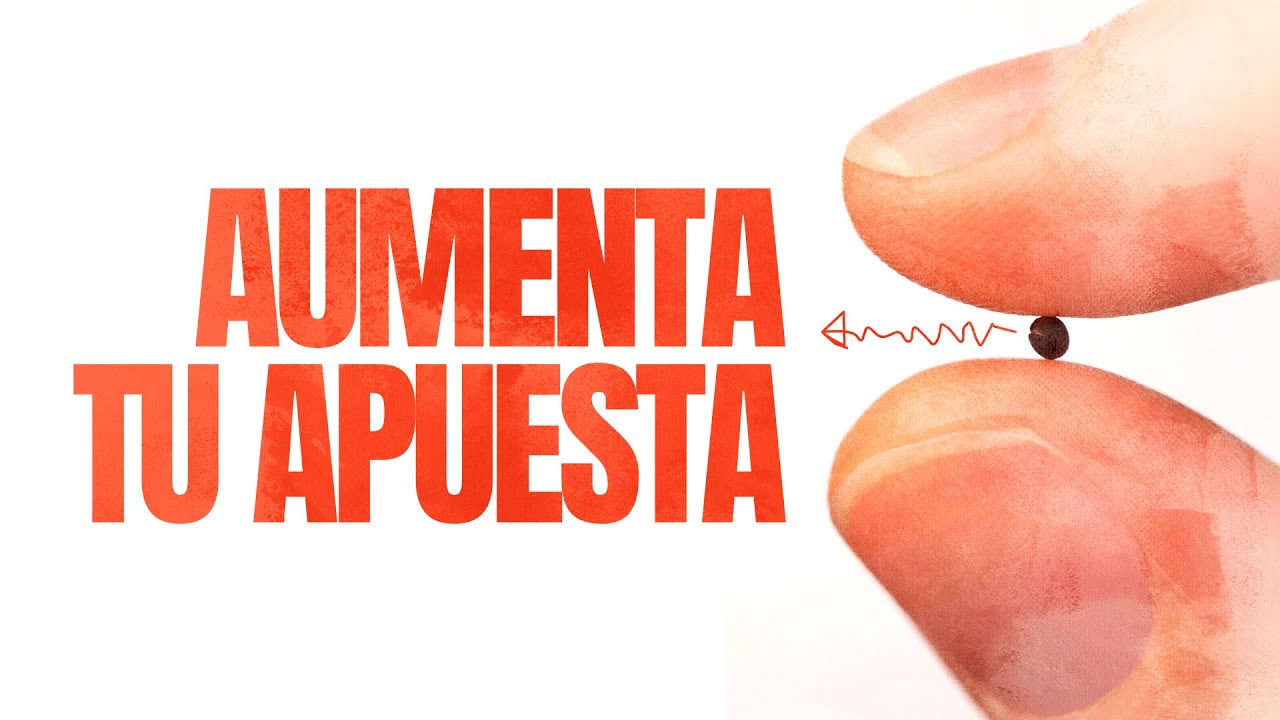 Un dedos sosteniendo una semilla de mostaza - Aumenta tu apuesta